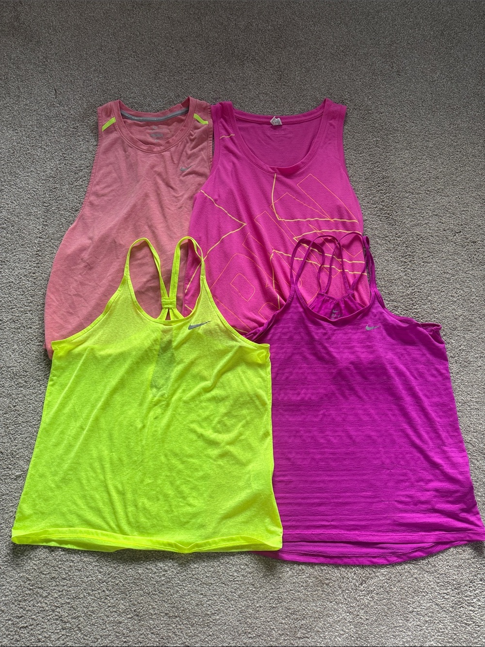 Lot of 4 Nike and Under Armour Exercise Tanks